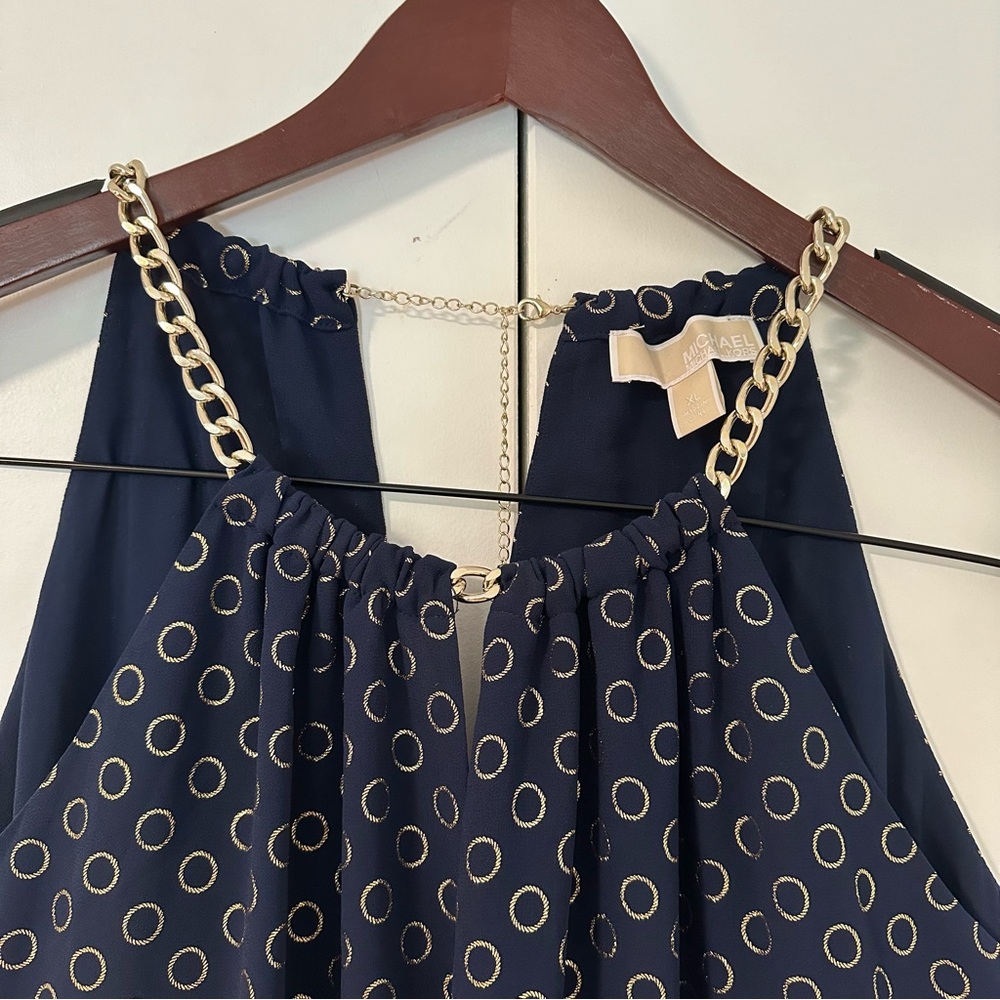 Michael Kors blue and gold cocktail dress with chain accent.